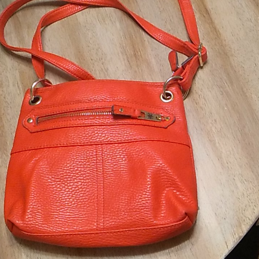 Hot orange crossbody bag.  Unbranded.